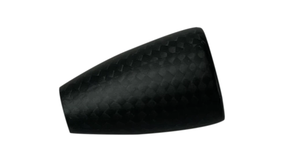 Carbon Fiber Tactical Bolt Knob laying on side